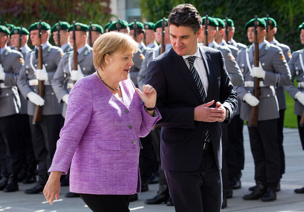 Kao premijer nije se previše bunio – Zoran Milanović s Angelom Merkel 2012. (Foto: Michael Kappeler/DPA/PIXSELL)